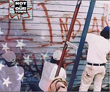 Volunteers from the Painters Union paint over racist graffiti on Dawn Fast Horses' home in Billings, Montana. From the award winning PBS Documentary 